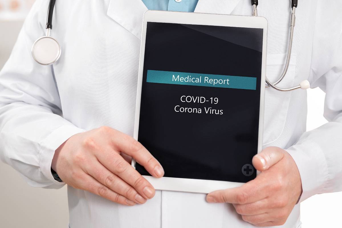 Global Pandemic Doctor holding medical report of COVID-19
