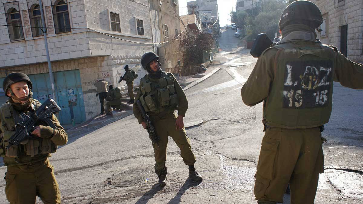 Martial Law Soldiers occupy a town after the government declares martial law